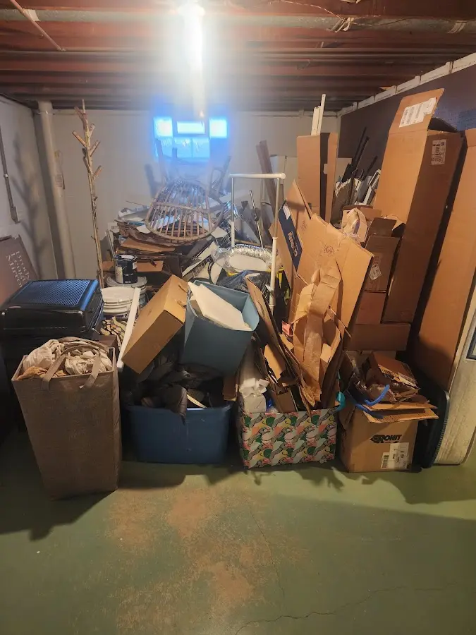 Roll-off dumpster container at job site for Yard Waste Dumpster Rental in Manchester